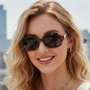 Chic oval tortoise shell sunglasses with UV protection for a stylish outdoor look