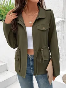 Detail view of olive green drawstring waist jacket with utility pockets and zip front