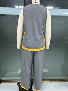 Rear view of a stylish gray sleeveless top and wide-leg pants set with yellow trim detailing.