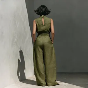 Back view of women's olive green cotton-linen sleeveless top and wide-leg pants set