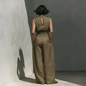 Back view of a chic olive green linen blend sleeveless top and wide-leg pants set