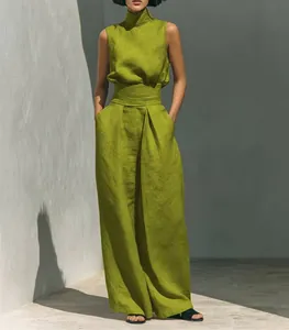 Detail of olive green linen-blend sleeveless top and wide-leg pants set for resort style