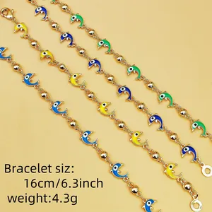 Bohemian ocean style dolphin charm bracelet with gold chain and colorful enamel