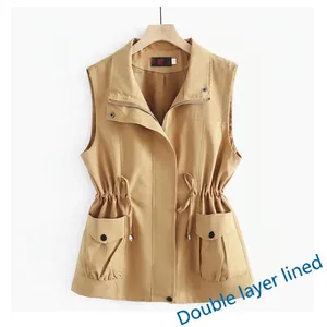 Detail of khaki women's vest with drawstring waist and double layer lining.