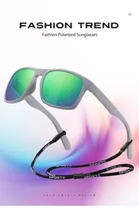 Fashionable sports polarized sunglasses with vibrant green lenses and neck strap.