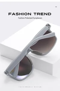 Close-up of grey fashion polarized sports sunglasses on a white display block