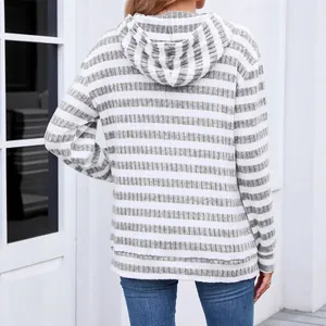 Back view of a fashionable casual grey and white striped hooded sweatshirt for women