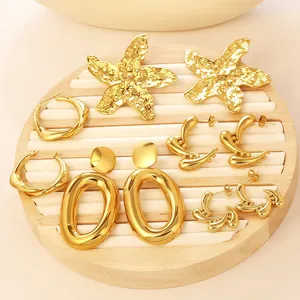 Elegant gold-plated geometric earring collection featuring starfish and large hoop designs