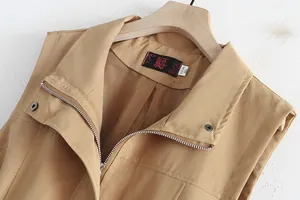 Close-up of the collar and zipper on a casual khaki vest for middle-aged women