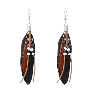 Bohemian long feather earrings with polka dot details and ethnic beads for women