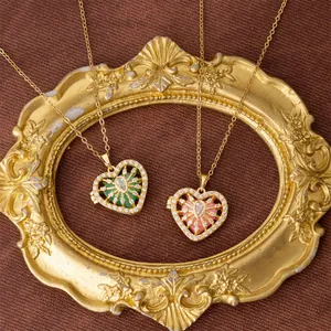 Vintage style heart-shaped locket necklaces with natural green and pink stones in gold