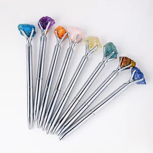 Set of eight natural crystal raw stone ballpoint pens with polished silver metal body