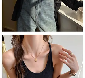 Detail view of a black ribbed slim-fit camisole tank top for a minimalist look.