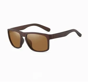 Close-up side view of matte brown sports sunglasses with polarized tinted lenses