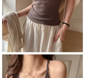 Close-up of brown ribbed camisole vest showing slim fit texture and fabric details.