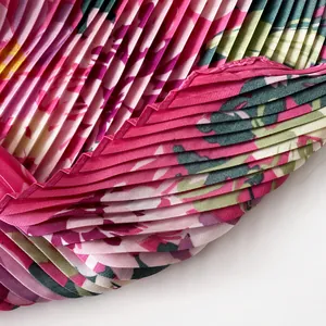Close-up of pink floral printed pleated satin silk scarf with fine micro pleats detail