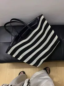 Large capacity black and white striped woven tote bag with durable leather straps