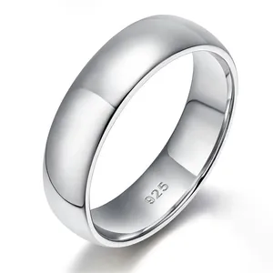 Close-up of classic polished S925 silver band ring with inner 925 engraving