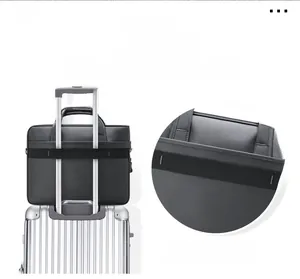 Close-up detail of a professional men's briefcase with a sturdy trolley strap for travel