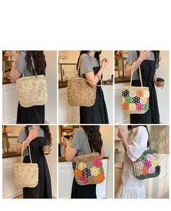 Handmade woven straw tote bag with hollow flower design in various colors.
