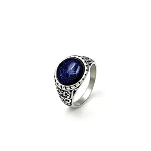 Vintage men's titanium steel ring with oval blue sandstone and intricate engraved patterns