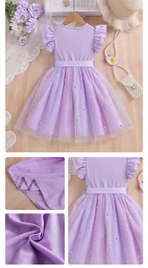 Detail view of purple girls princess dress with star sequins and mesh layers