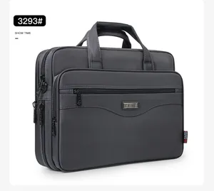 Detailed side view of a gray large capacity Oxford business laptop briefcase with handles