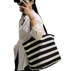 Stylish black and white striped woven tote bag with large capacity for fashion women
