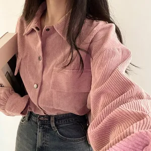 Detailed shot of retro pink corduroy loose shirt featuring lapel and front pocket design