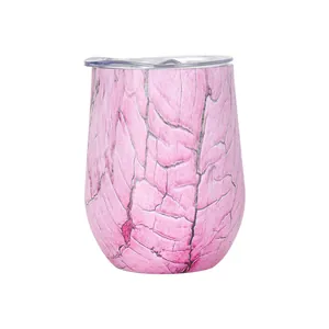 Close-up of a 12oz pink cracked texture stainless steel egg-shaped wine tumbler