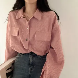 Detailed view of a pink vintage corduroy long-sleeved shirt with front pockets