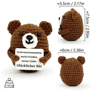 Hand-crocheted brown bear toy desk ornament with German message card and size info