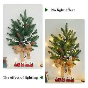 Festive Christmas wall hanging wreath with pine cones and warm LED lights for home