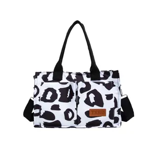Stylish large capacity tote bag with black and white leopard print for daily commute