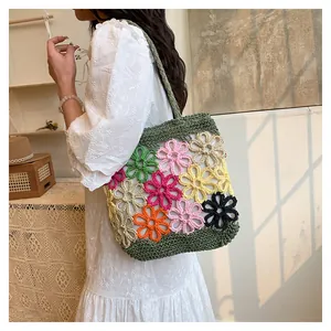 Bohemian handmade crochet floral tote bag with colorful hollow-out patterns for women