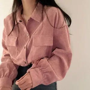 Stylish vintage pink corduroy long-sleeve loose shirt jacket with classic lapel collar