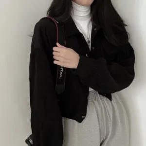 Minimalist black corduroy loose jacket with lapel collar and short waist design