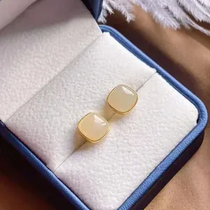 Exquisite minimalist S925 silver gold plated sugar cube stud earrings in a blue jewelry box
