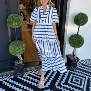 Women's stylish blue and white striped tiered maxi dress with puff sleeves and V-neck