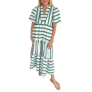 Elegant green and white striped tiered maxi dress with V-neck and stylish puff sleeves