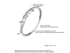 Detail of minimalist silver heart ring featuring AAA cubic zircon and mirror finish
