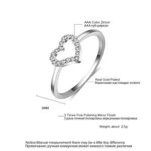 Silver heart-shaped ring detail displaying AAA cubic zircon stones and parameters