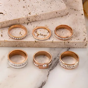 Set of six rose gold stainless steel rings with sparkling cubic zirconia accents