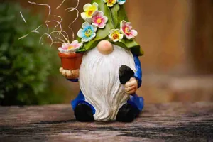 Detailed macro view of a solar garden gnome with a floral hat and fiber optic lights