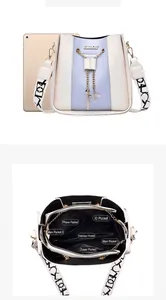 Detailed view showing interior compartments and 9.7 inch iPad size comparison for bucket bag