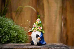 Solar powered garden gnome statue with LED copper lights for outdoor courtyard decoration