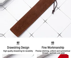Close-up of brown velvet pen bag showing fine stitching and drawstring detail