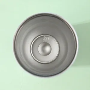 Close-up inside view of a 30oz stainless steel tumbler showing food-grade 304 material