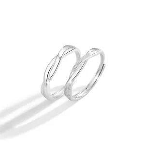 Mobius fine silver 999 couple rings with minimalist twist design and frosted finish