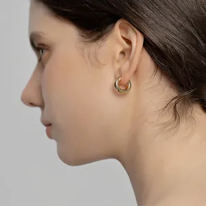 Minimalist gold plated hoop earrings for women featuring a vintage elegant design